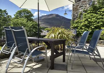 Outdoor seating area with stunning views at Plas Tan y Graig B&B Guest House, Beddgelert, Snowdonia, North Wales